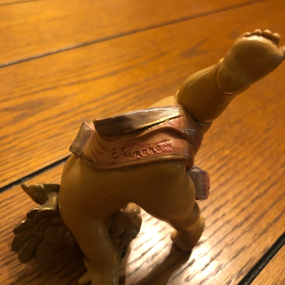 This cute cherub figurine made us Italy